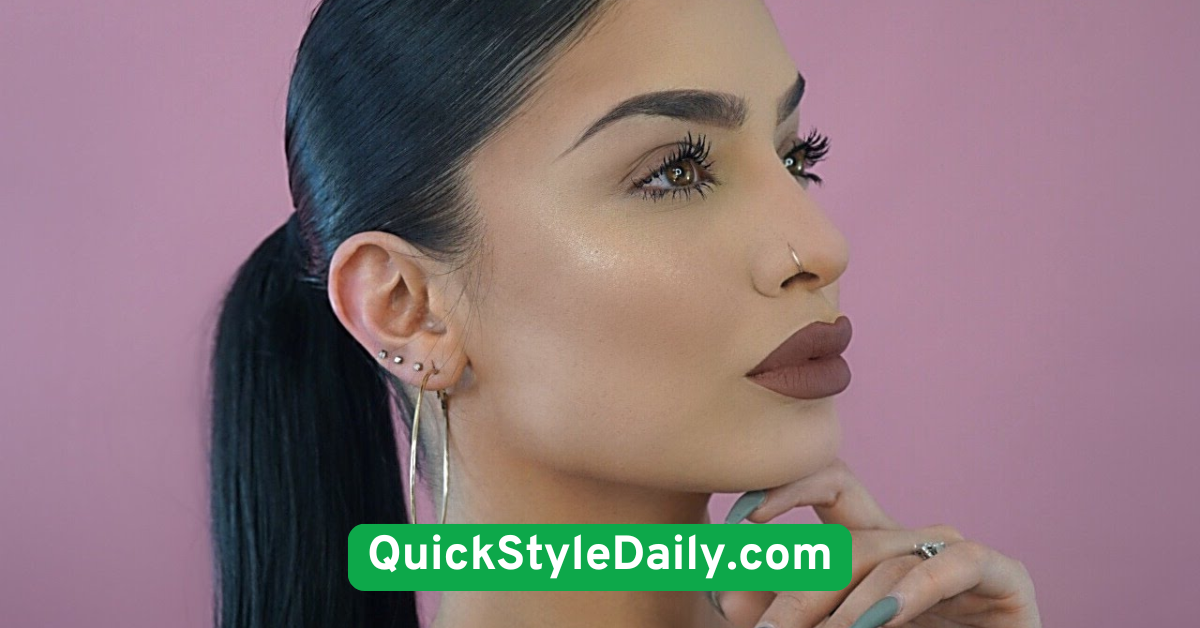 Sleek Low Ponytail with Middle Part